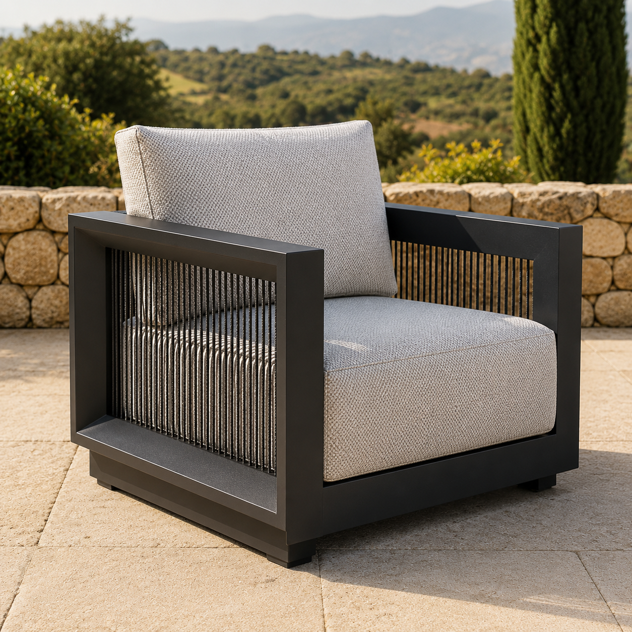 Ikos Outdoor Lounge Set lounge chair lifestyle image in onyx